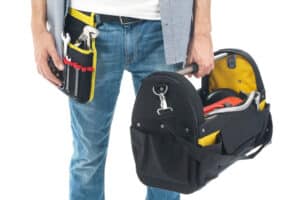 plumber with tool bag