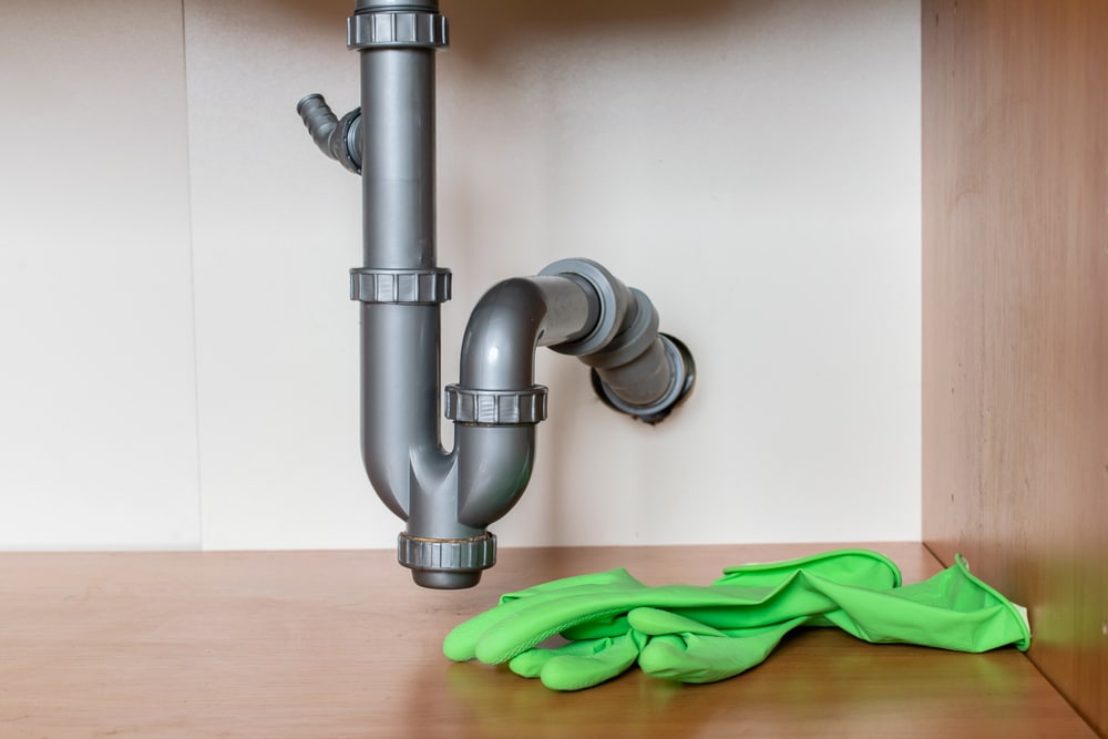pipe under the kitchen sink