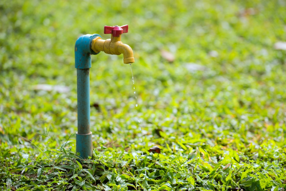 Brass water tap on park, Selective focus